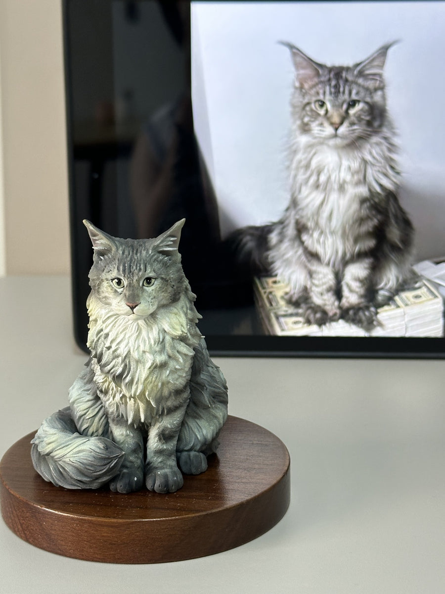 Reference photo beside the finished custom cat resin figurine